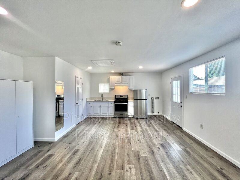 10977 Pope Ave #1-2 - Photo 3 of 13
