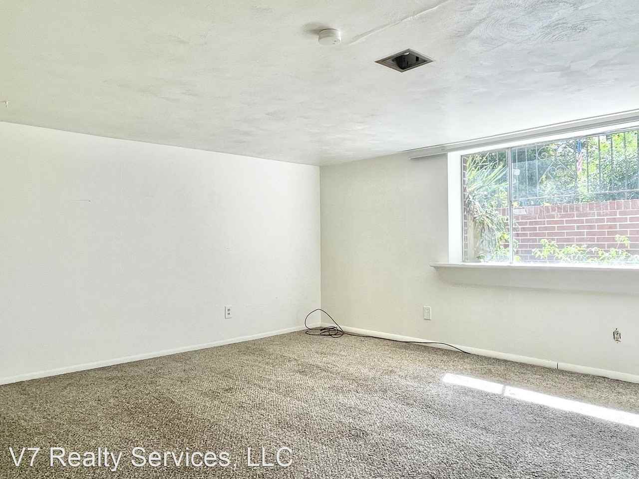 100 W. - Photo 2 of 15