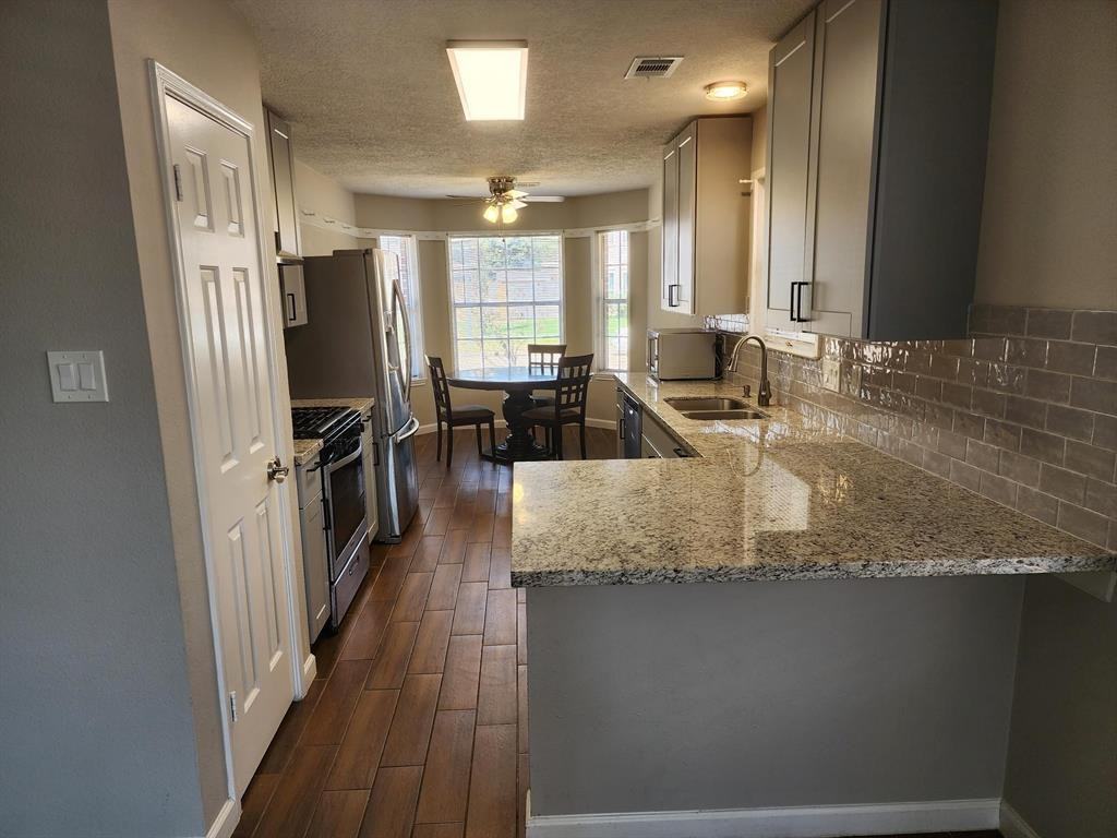 8307 Holmwood Dr - Photo 2 of 24