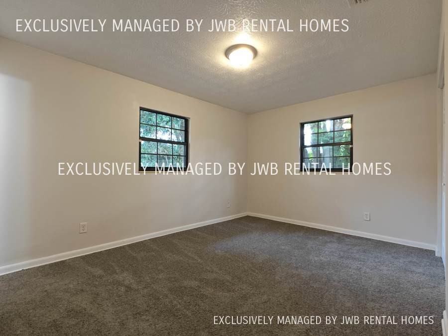 7606 Knoll Dr N - Photo 2 of 8
