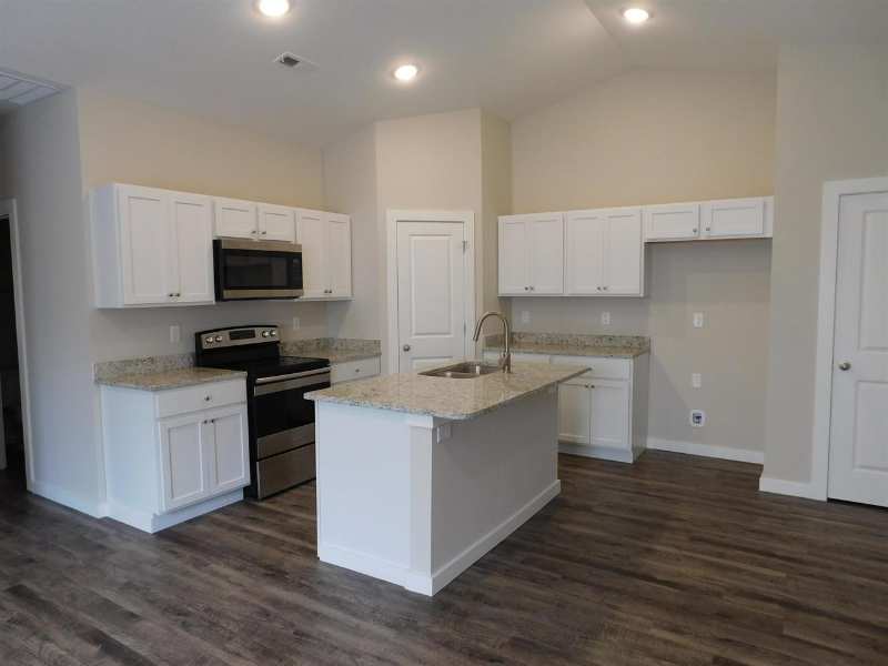 1721 E 69th Ct N - Photo 3 of 12