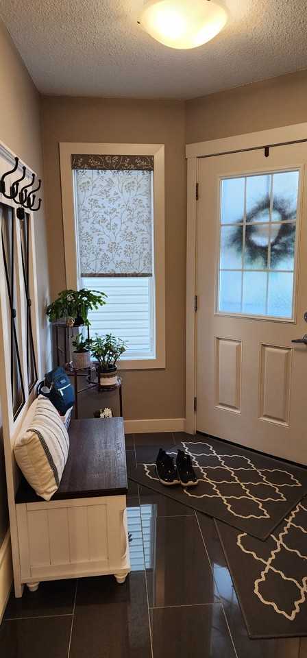 Spacious 3 bed 2.5 bath duplex*Fenced yard w/deck*Fireplace*Double Garage* - Photo 2 of 46