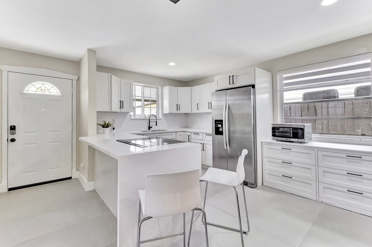 E 8th St - Photo 5 of 15