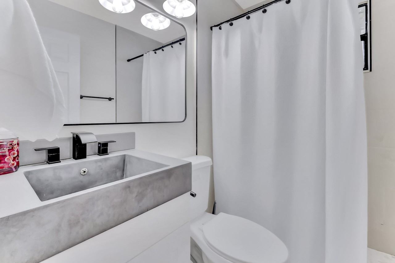 E 8th St - Photo 4 of 15