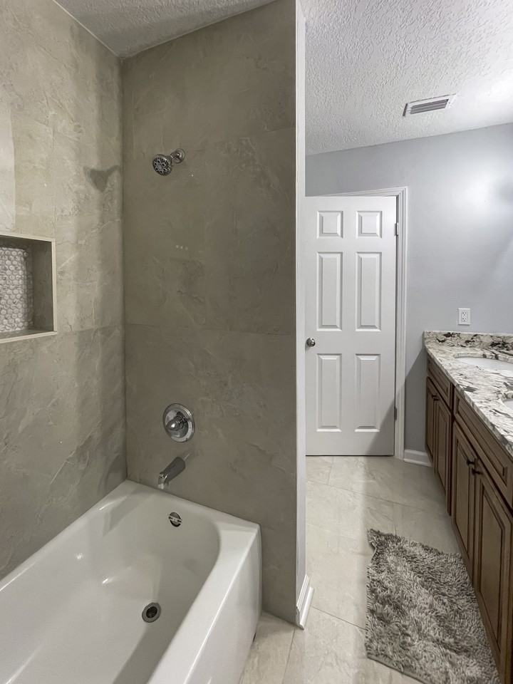 W 32nd St - Photo 2 of 13