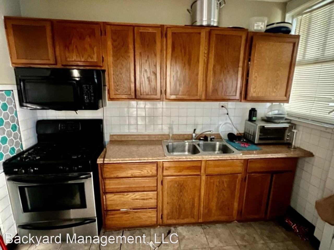 6866-6882 N. Overhill Avenue - Photo 3 of 5