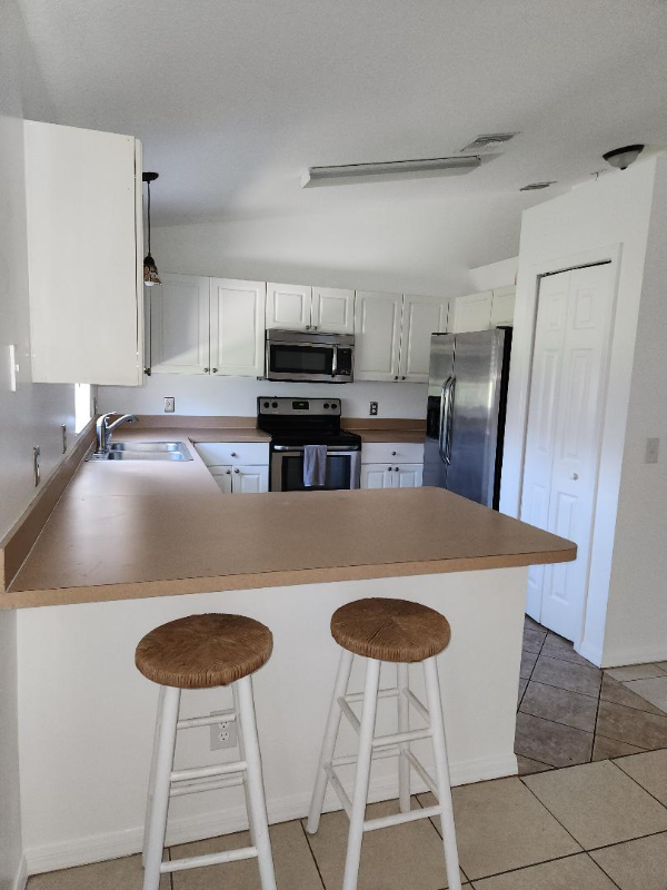 7846 100th Ave - Photo 3 of 16