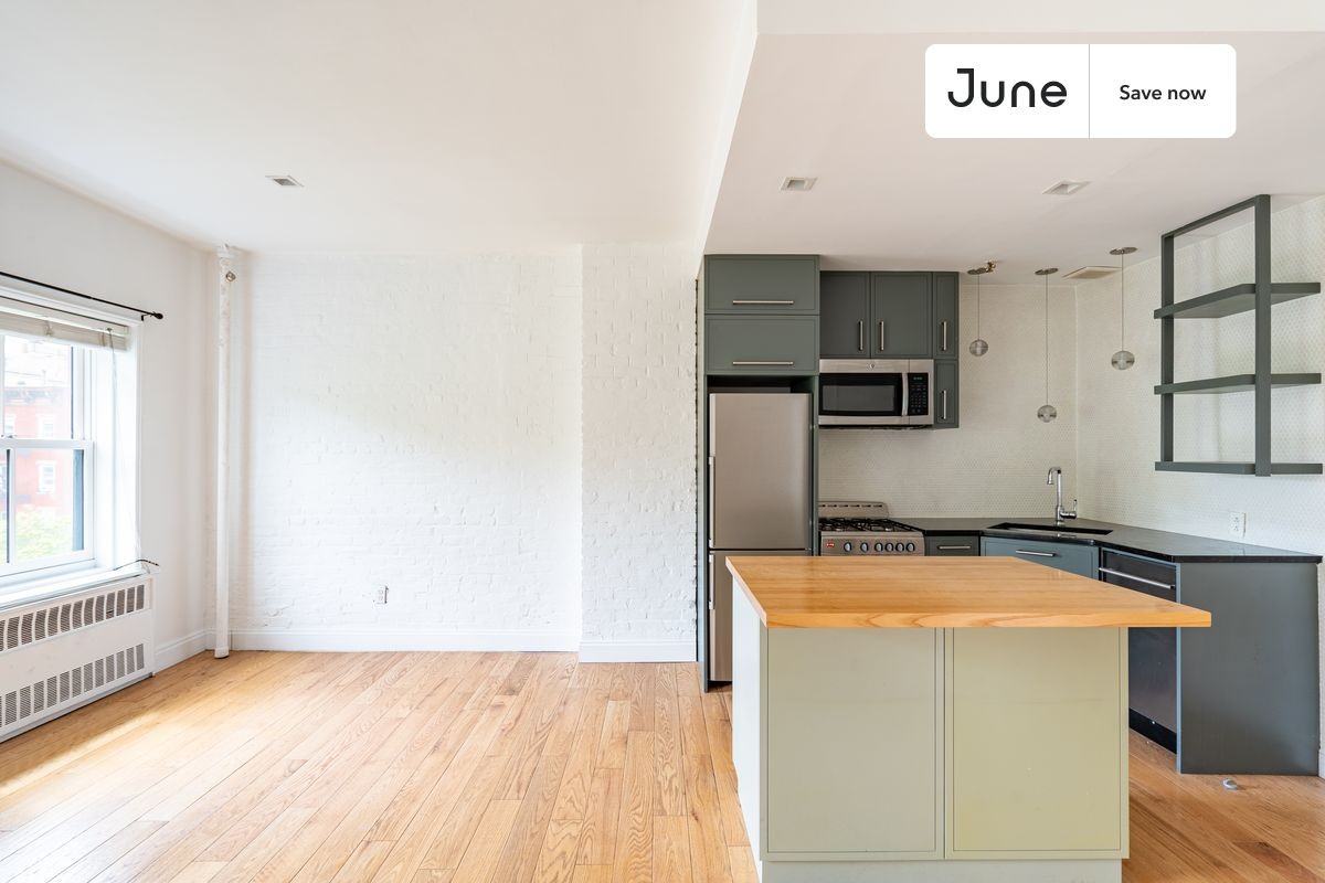 491 W 22nd St #4F