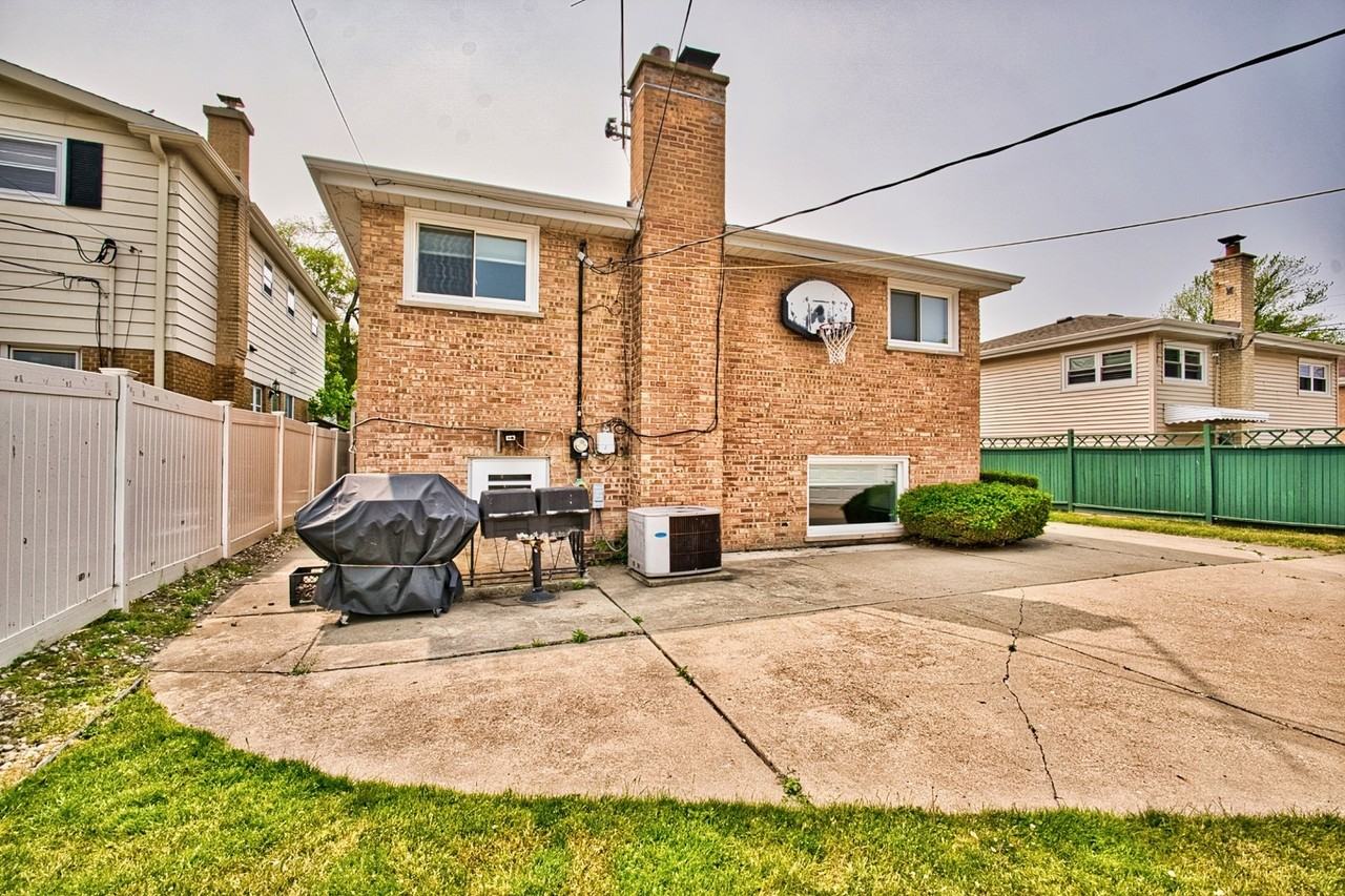 7705 Kostner Ave - Photo 3 of 37