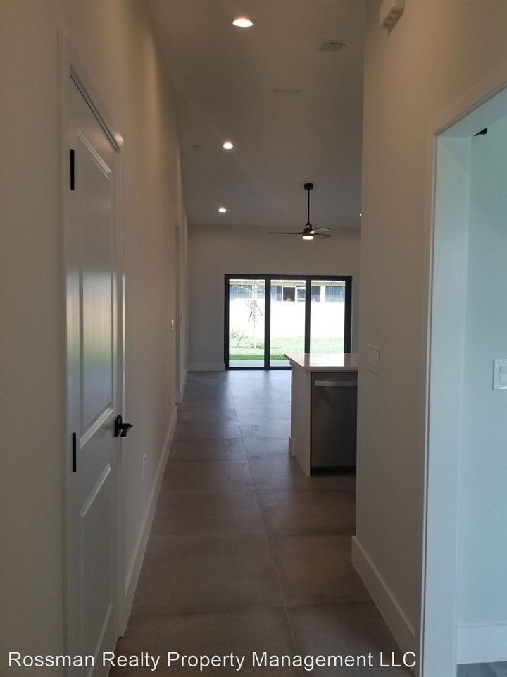 New Construction Duplex  3 + Den / 2 & 2 Car Garage - Photo 2 of 22