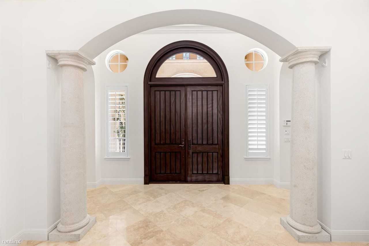 11209 Orange Hibiscus Ln