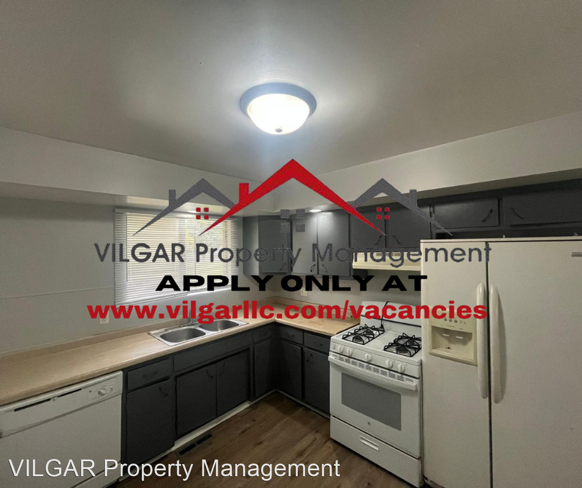 210-212 E 54th Ave - Photo 2 of 16