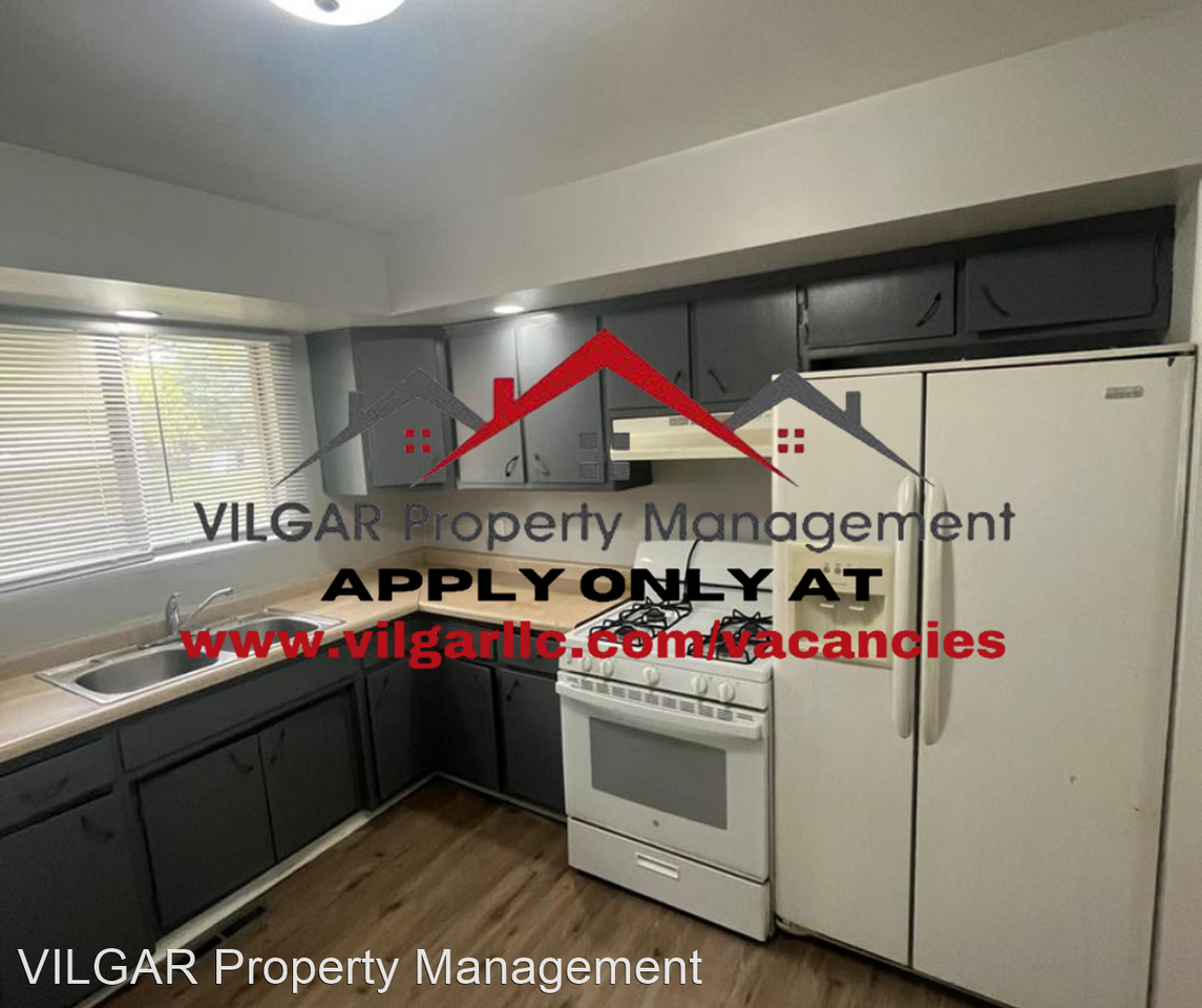 210-212 E 54th Ave - Photo 3 of 16