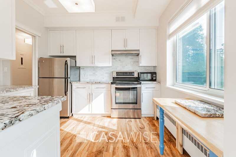 12207 Jasper Ave Nw #101 - Photo 2 of 18