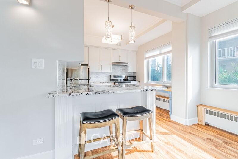 12207 Jasper Ave Nw #101 - Photo 3 of 18