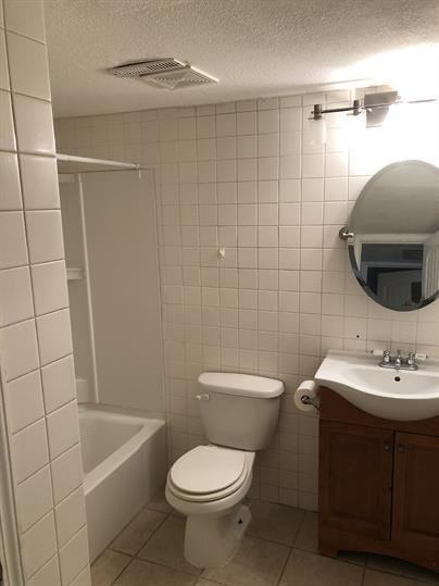 Village Apartments - Photo 3 of 5