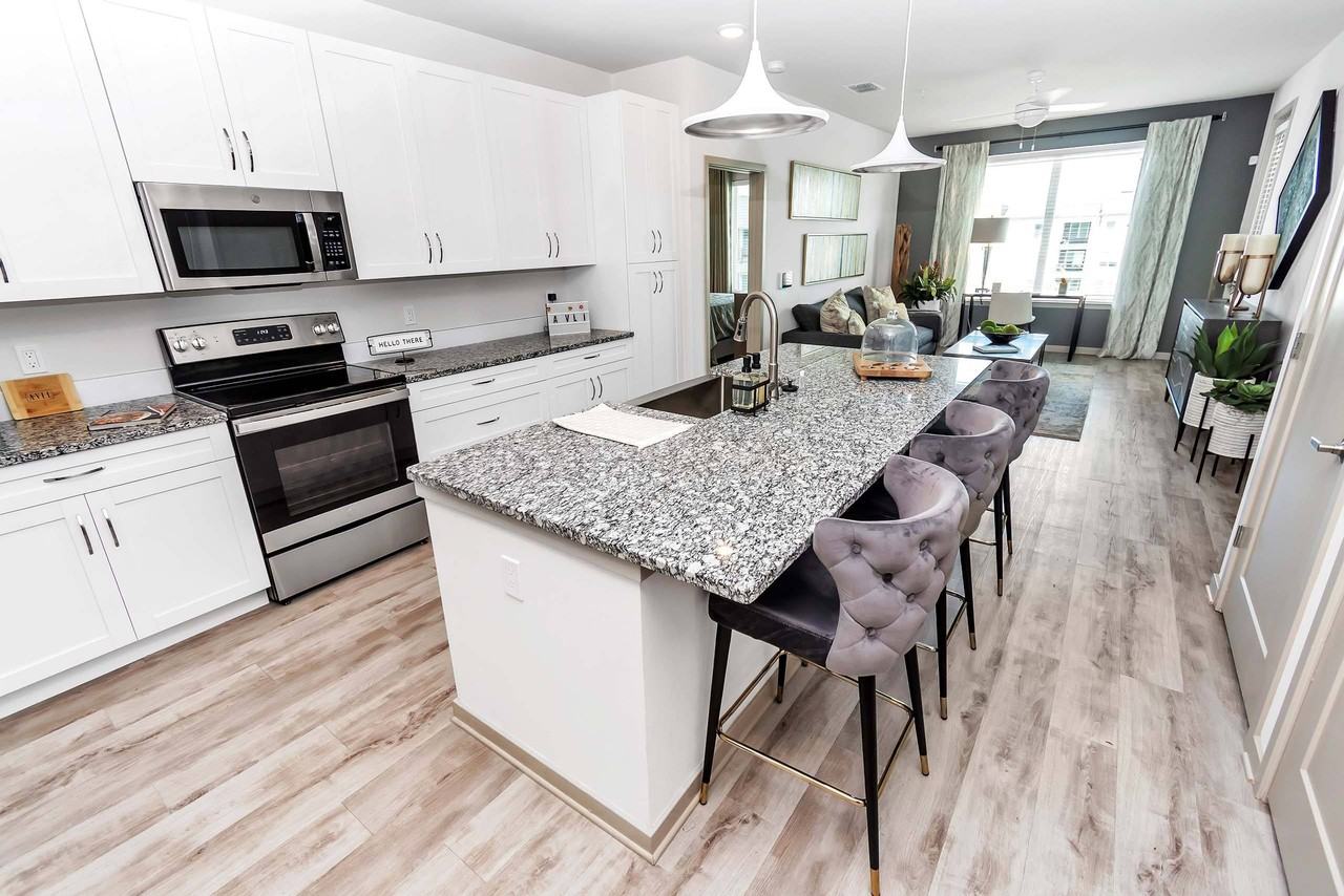 AVLI AT CROSSTOWN CENTER APARTMENTS - Photo 3 of 32