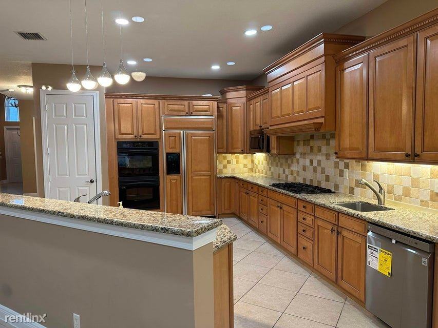 10229 Isle Wynd Ct - Photo 3 of 24