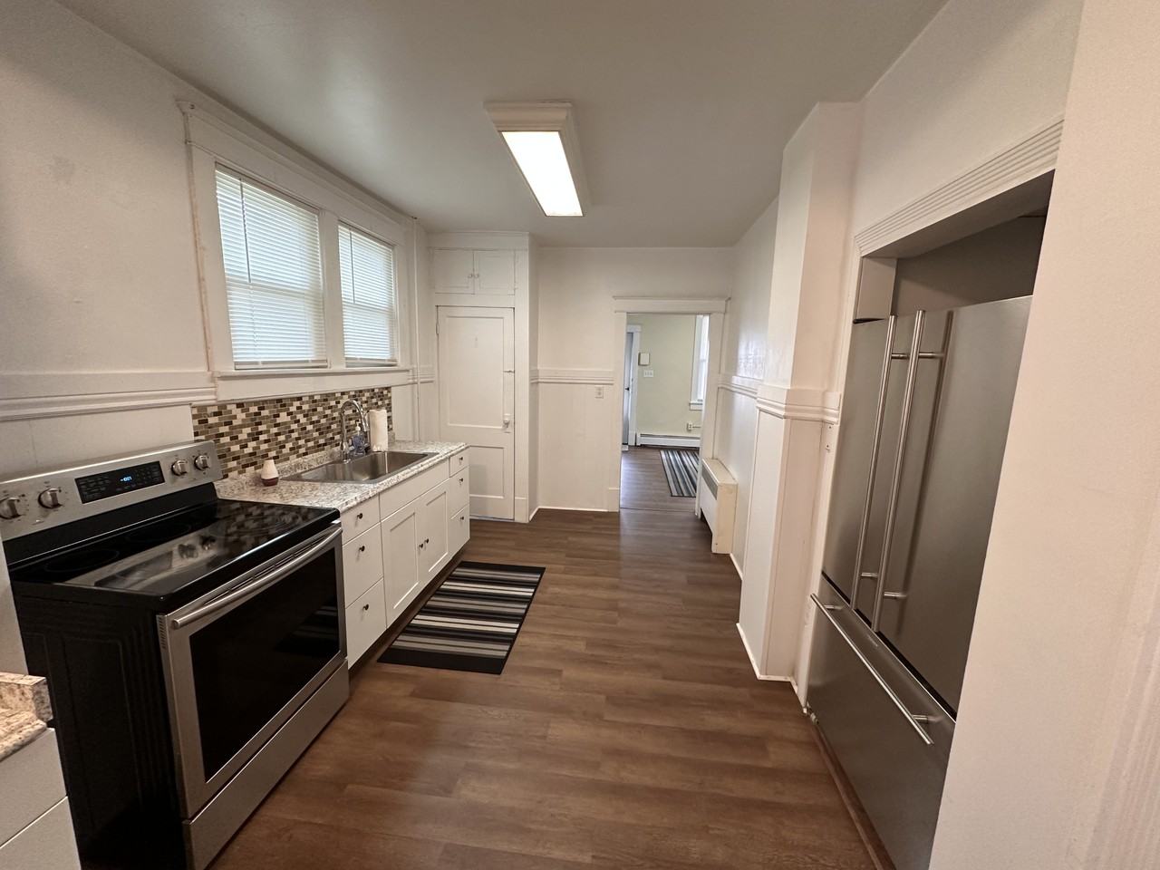 212 Spring St - Photo 2 of 12