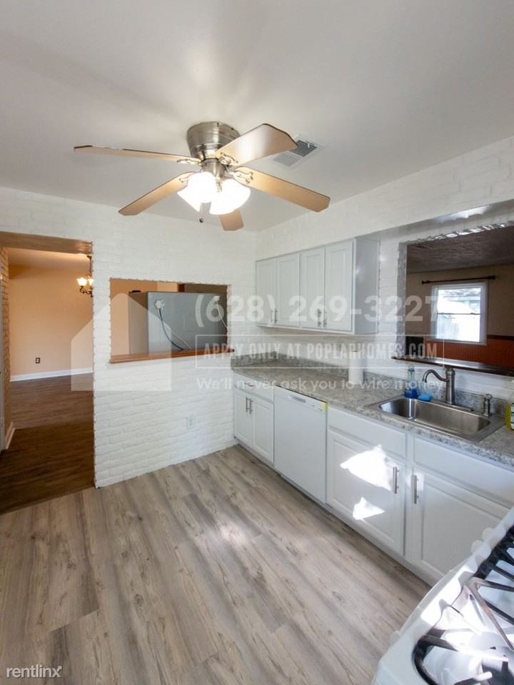 7711 Queens Park Rd - Photo 3 of 31