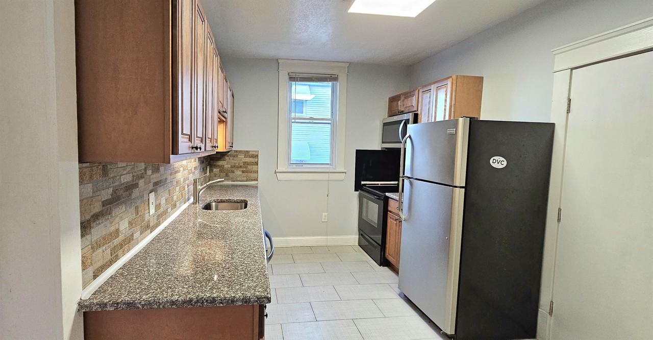 1345 W 65th St #DOWN - Photo 2 of 21