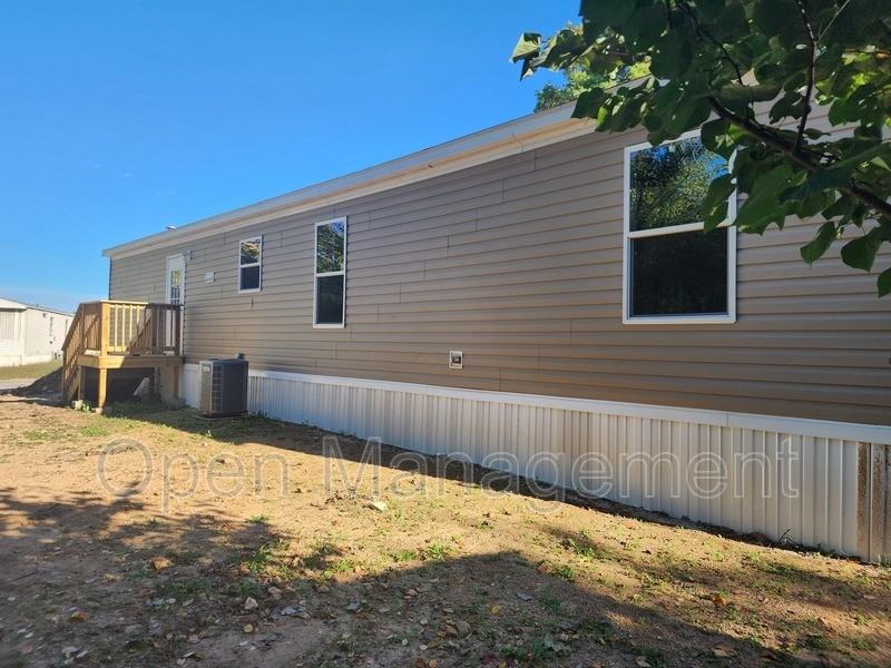 English Village Manufactured Home Community - Photo 2 of 45