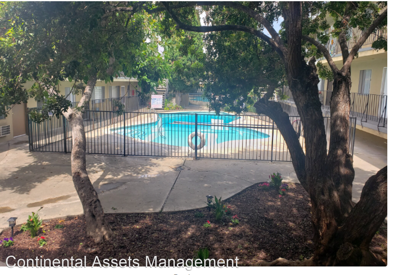 Hacienda Plaza Apartments - Photo 2 of 7