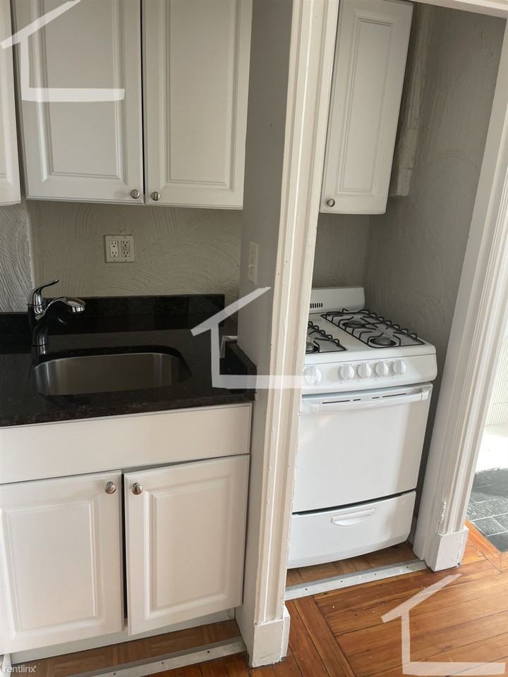 47 Jfk St - Photo 2 of 4