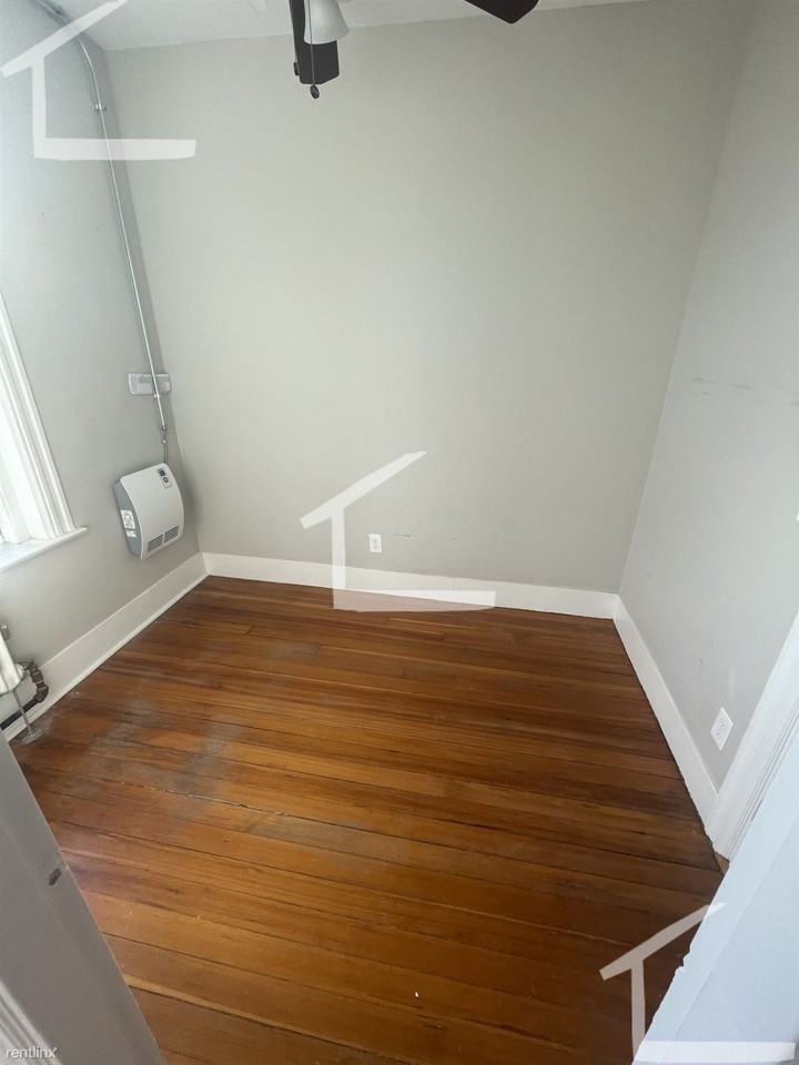 52 JFK St - Photo 3 of 4