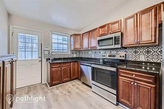 8135 Scotts Level Rd - Photo 2 of 21