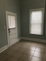 featured image of 219 E 3rd St #1