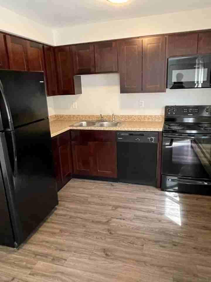 IMMACULATE TOWNHOMES - Photo 3 of 8