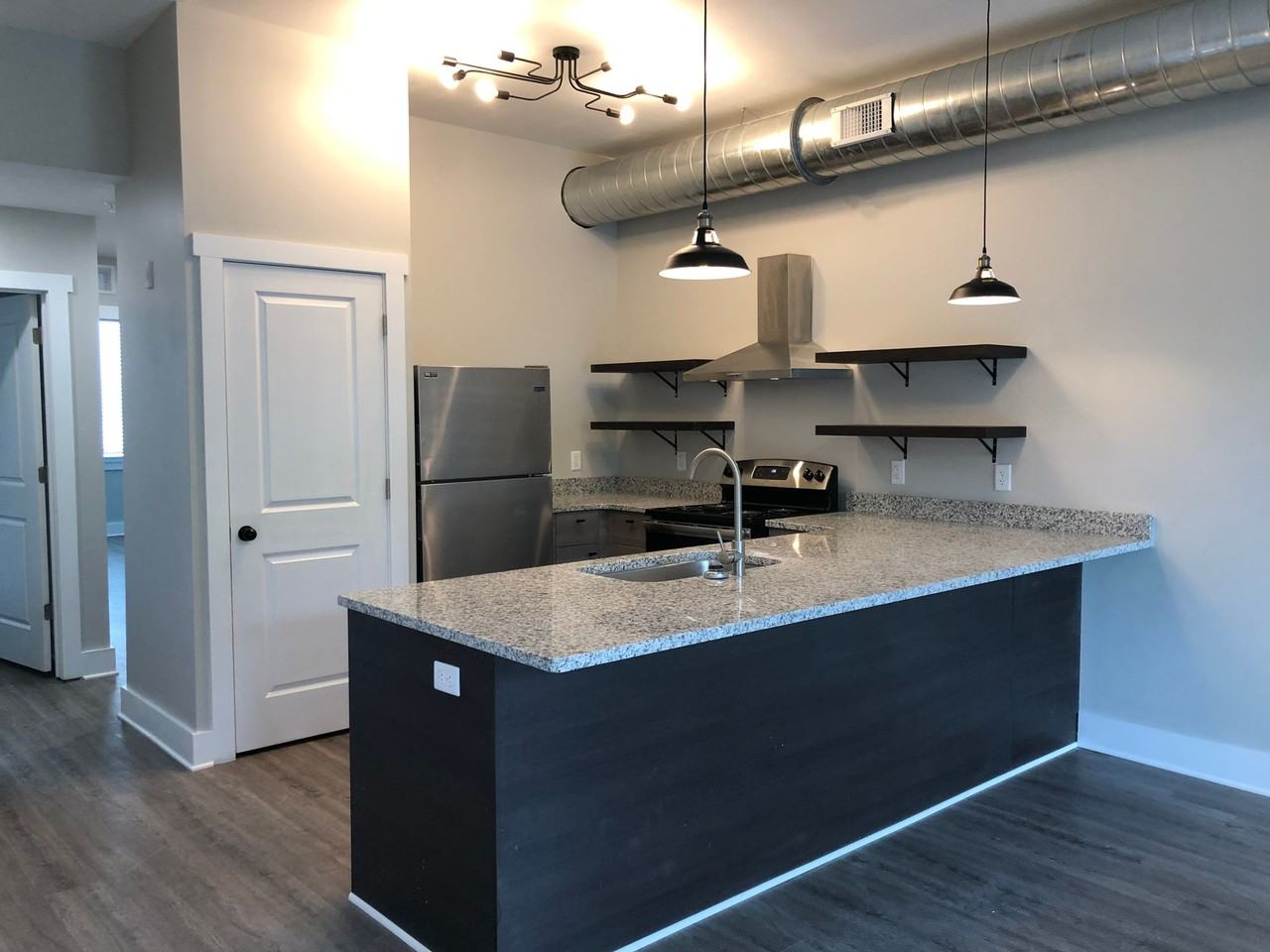 The Warehouse Apartments - Photo 6 of 48