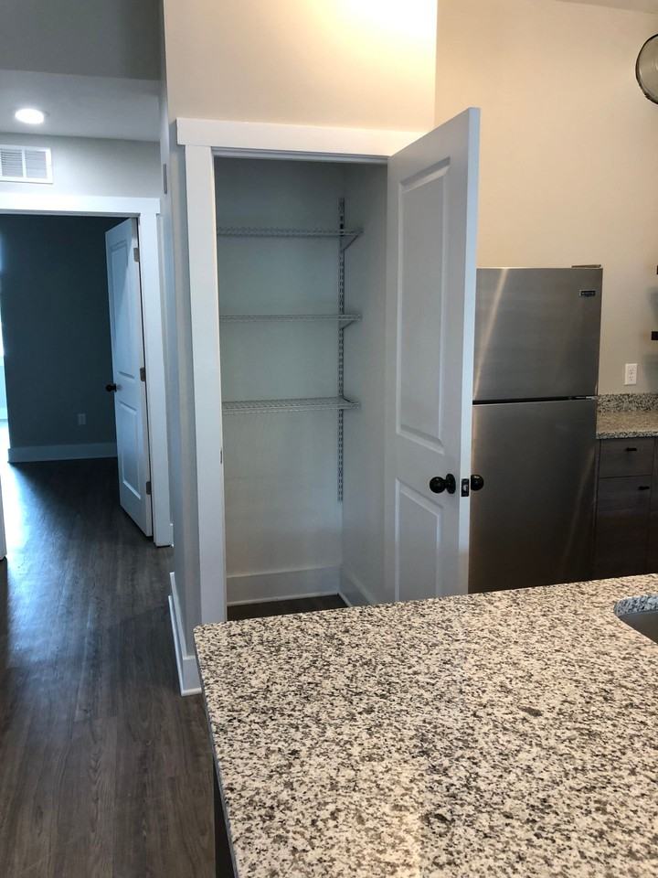 The Warehouse Apartments - Photo 7 of 48