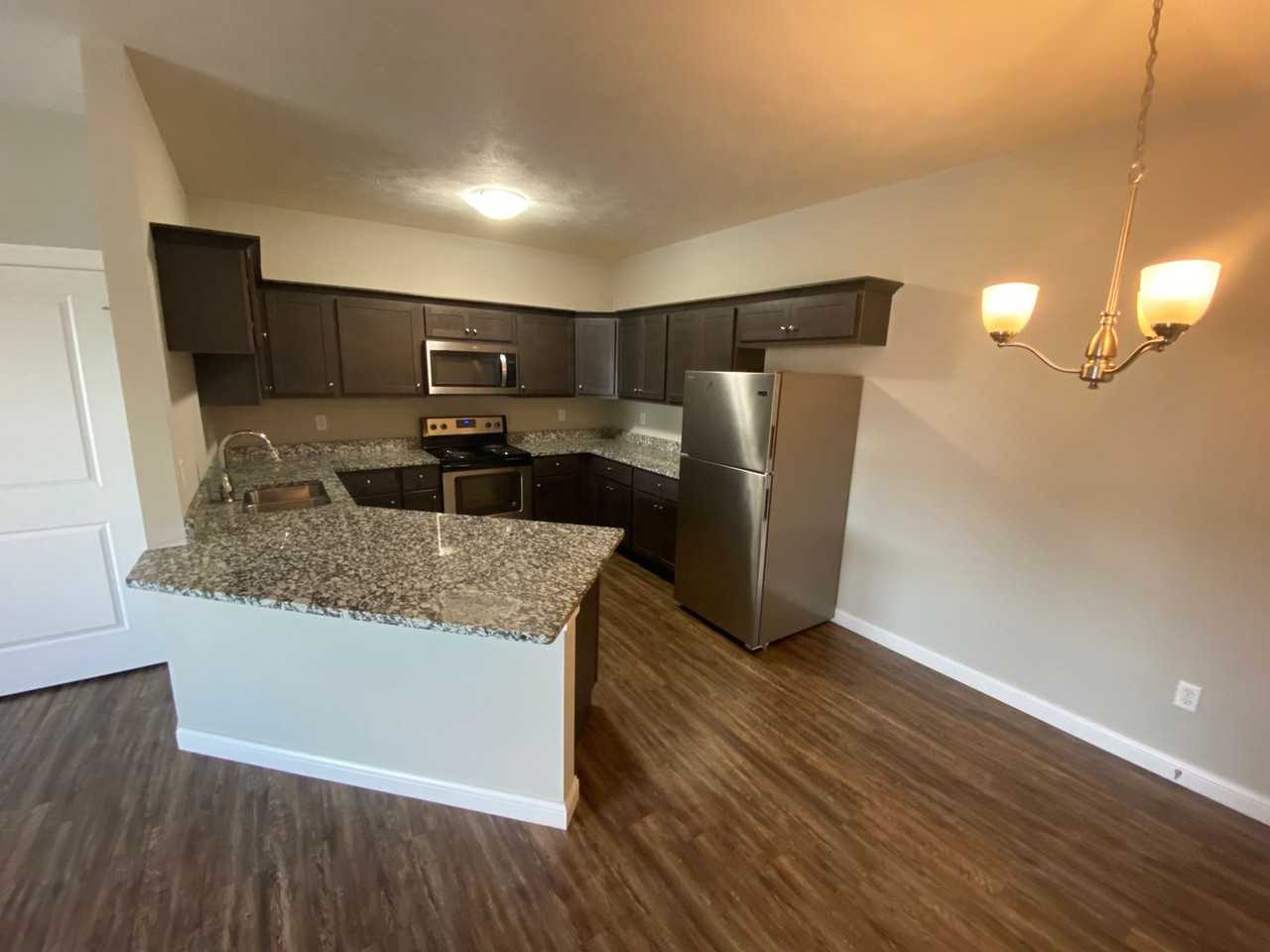 1037-1041 Ekstam Drive - Photo 2 of 6