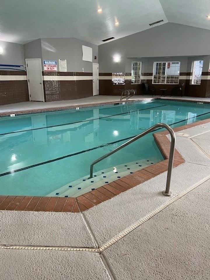 Signature Apartments - Photo 4 of 14