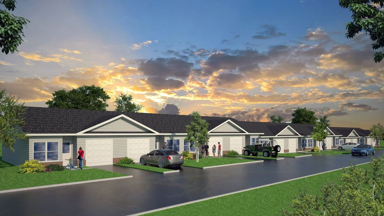 Ground level one bedroom unit with attached garage and private laundry