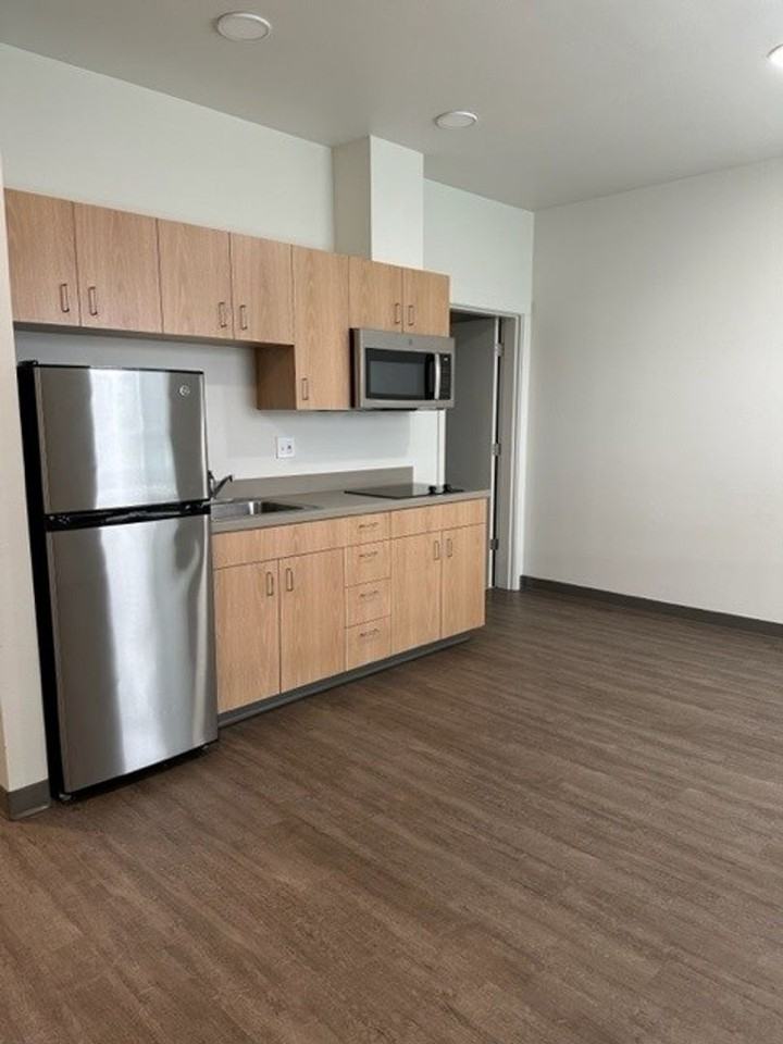 206- 990 Broadway Apartment Homes - Photo 2 of 27