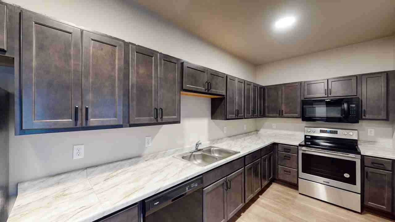 District 29 Apartments & Townhomes - Photo 5 of 50