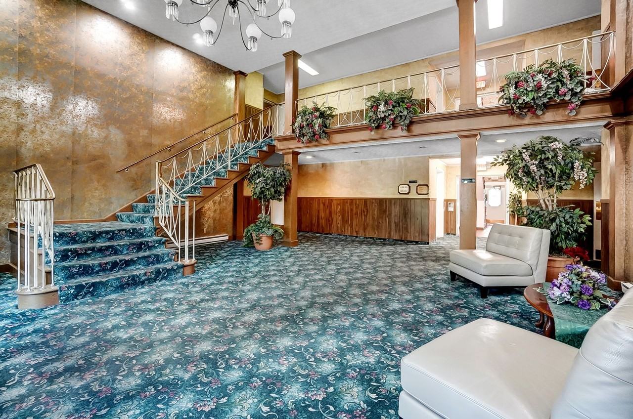 560 - REGENCY PLAZA - Photo 2 of 7