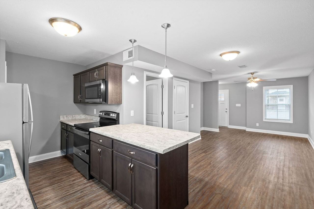 Professional Park Townhomes - Photo 5 of 43