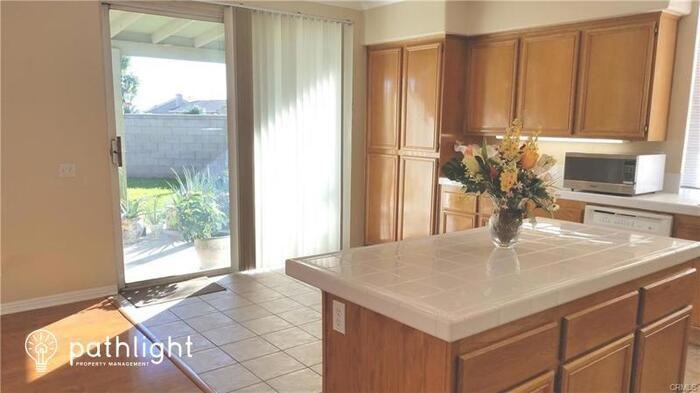15591 Eastwind Ave - Photo 3 of 7