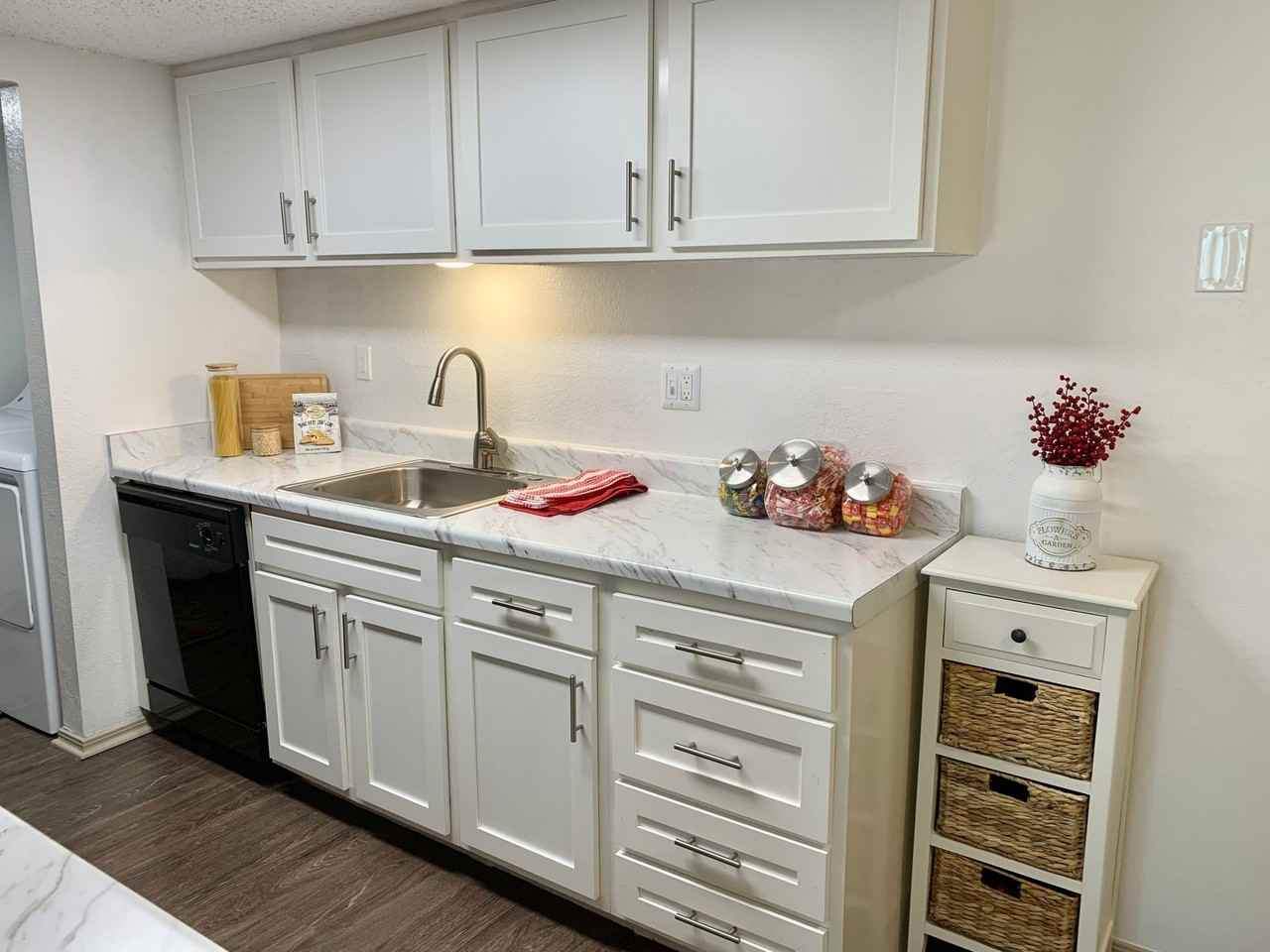 Quail Hollow Apartments - Photo 2 of 16