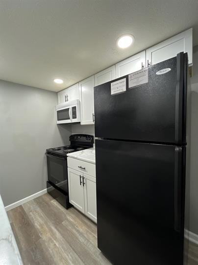 2110 J - Photo 2 of 7