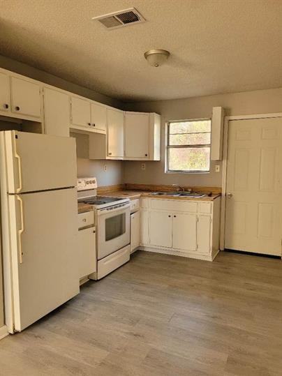 LAKEFRONT RENTALS ~ DUPLEXES - Photo 4 of 30