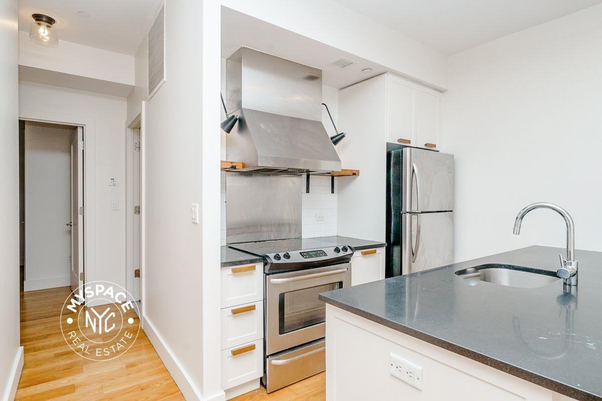 5527 Myrtle Ave #305 - Photo 4 of 33