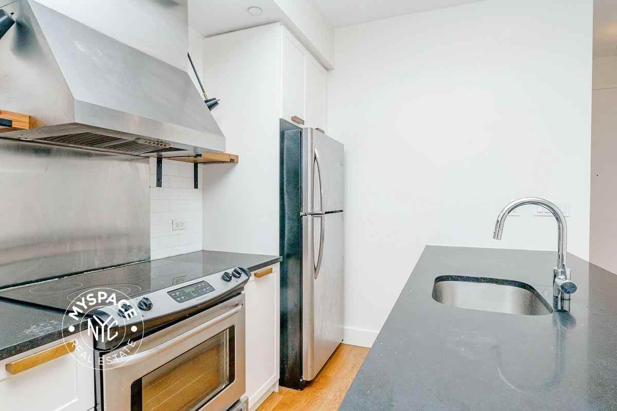 5527 Myrtle Ave #305 - Photo 6 of 33