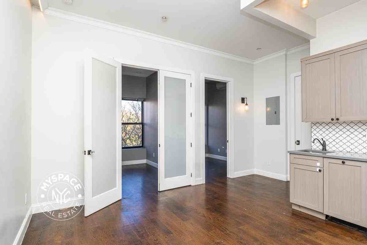 6080 Myrtle Ave #3E - Photo 2 of 16