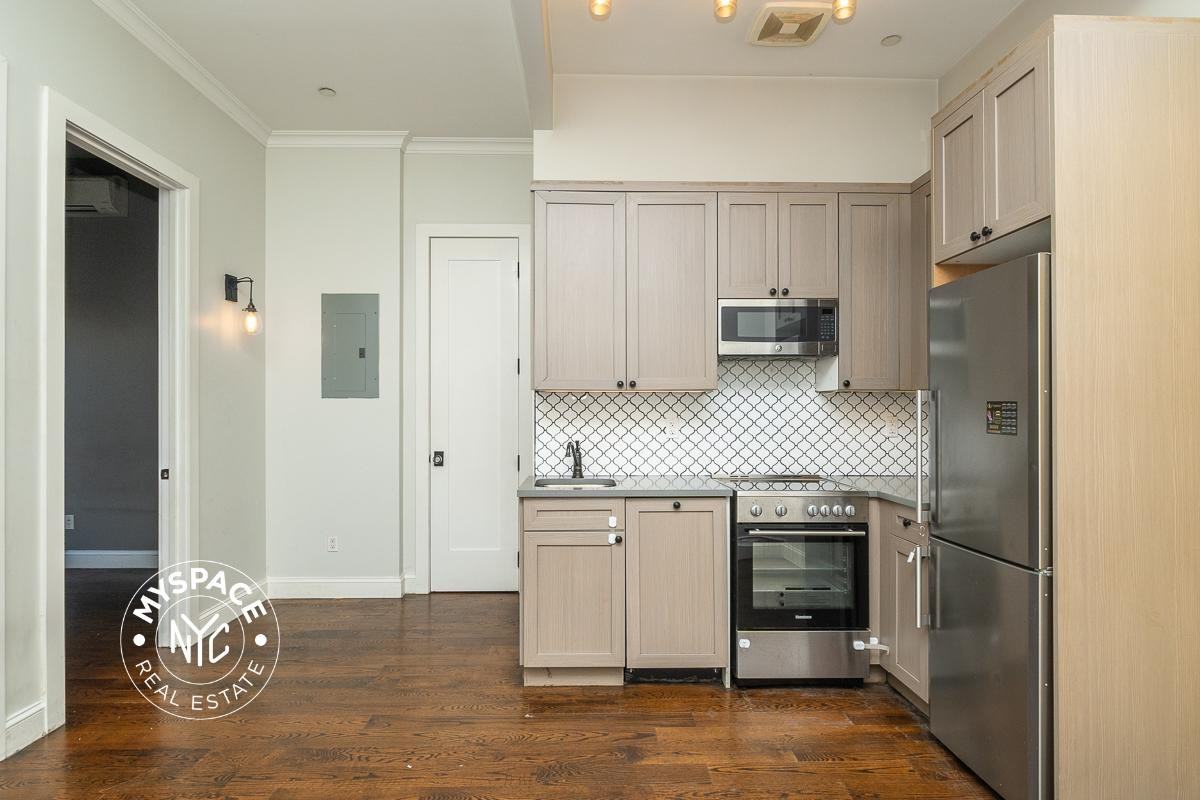 6080 Myrtle Ave #3E - Photo 3 of 16