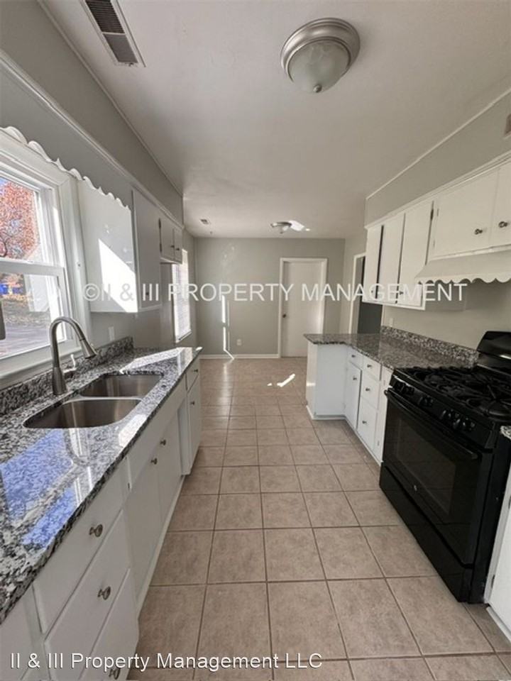 7819 Woodward St - Photo 2 of 17